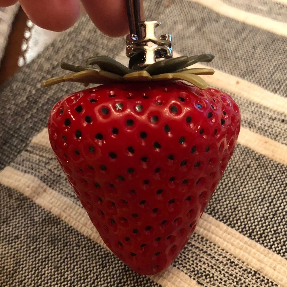 Authentic New with tag. Tory Burch Red Strawberry bag charm.